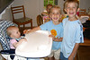 Estes > Andrew and Kirsten are happy to feed baby Kate