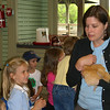 Estes > Kirsten's kindergarten class took a field trip to Maymont in Richmond. Here we pet a baby chick